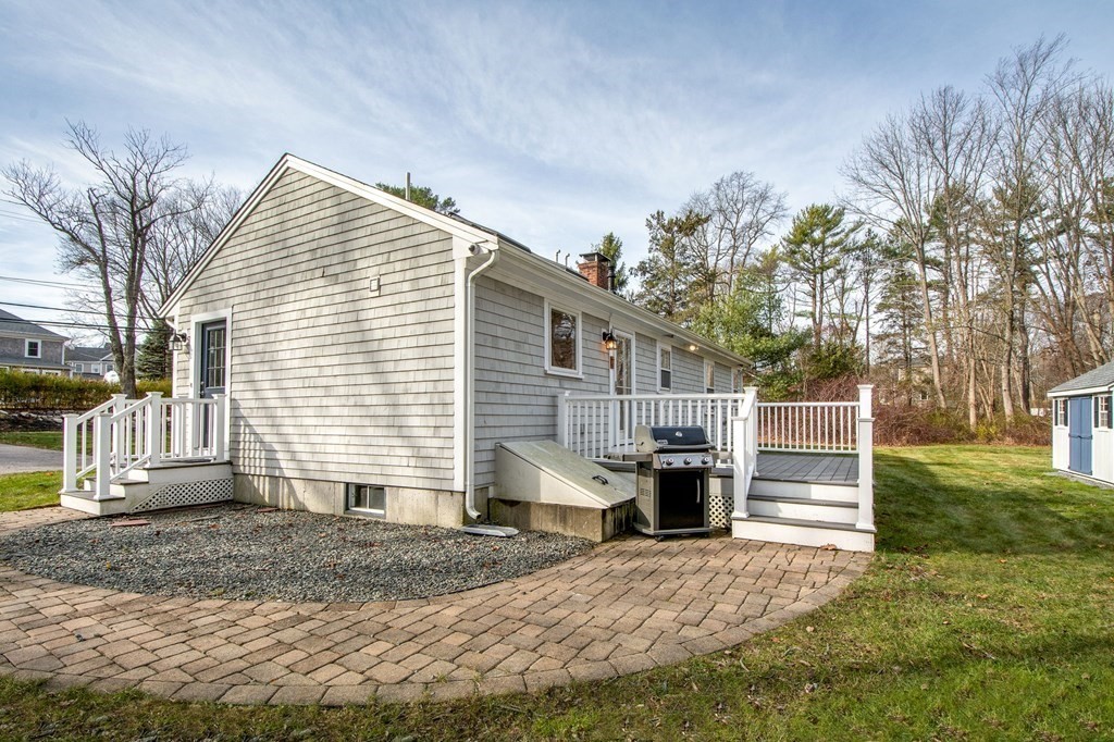 250 First Parish Road Scituate, MA 02066 - Photo 22 of 25 a front view of a house with a yard