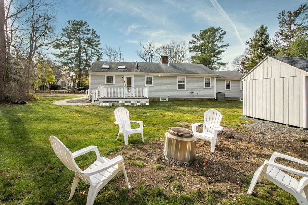 250 First Parish Road Scituate, MA 02066 - Photo 24 of 25 a view of a house with backyard porch and sitting area
