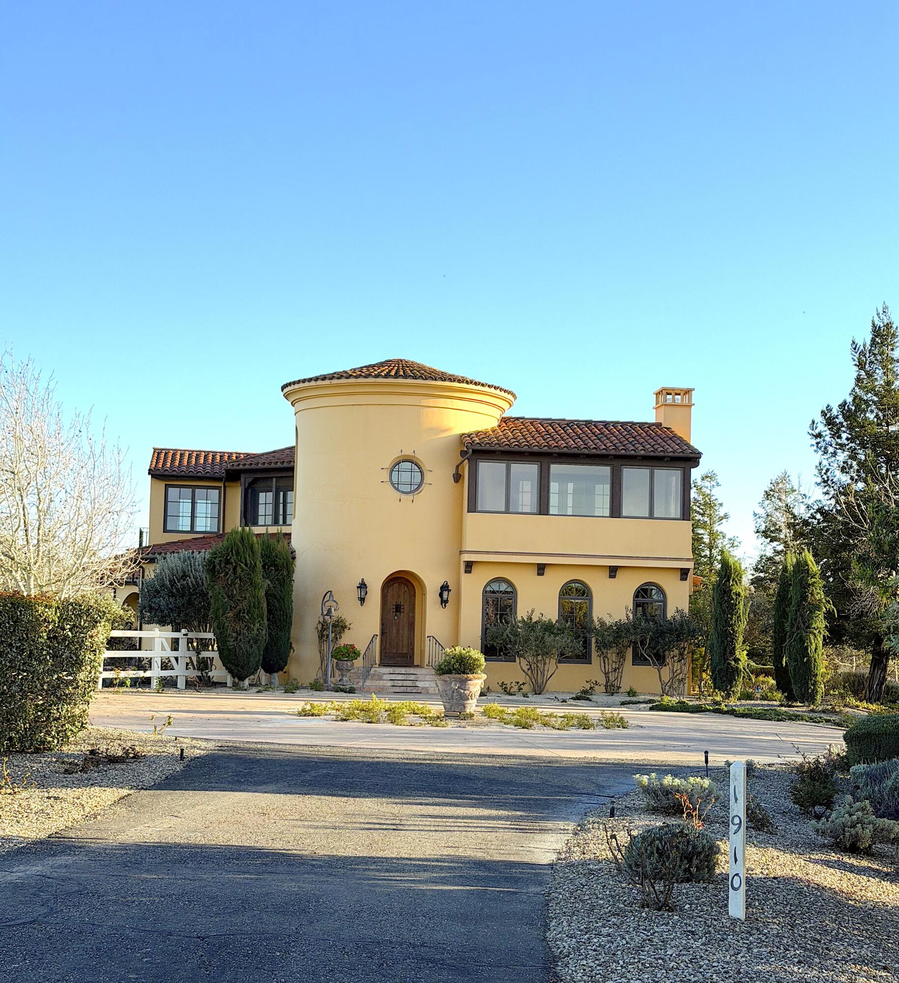 1910 Adobe Canyon Road Solvang, CA 93463 - Photo 3 of 3 a front view of residential houses with yard