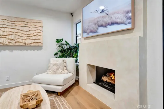 a bathroom with a double vanity sink toilet mirror and shower