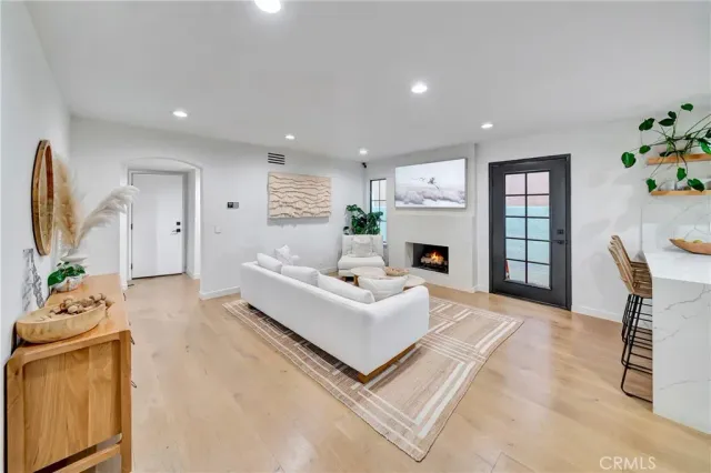 a bedroom with bed and a couch