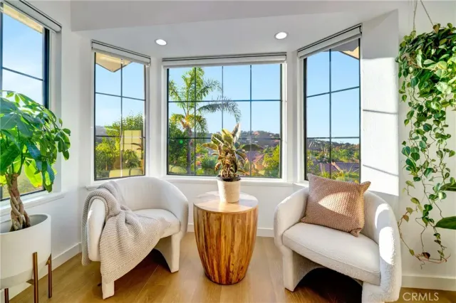 a spacious bathroom with a granite countertop sink mirror and a
