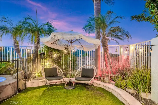 a view of a porch with seating space