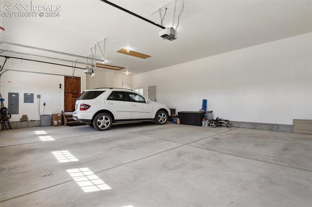 12810 Holmes Road Colorado Springs, CO 80908 - Photo 31 of 45 Attached 36'x25' Deep Garage