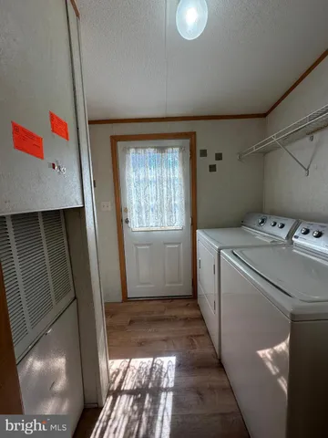 a storage room with wooden floor