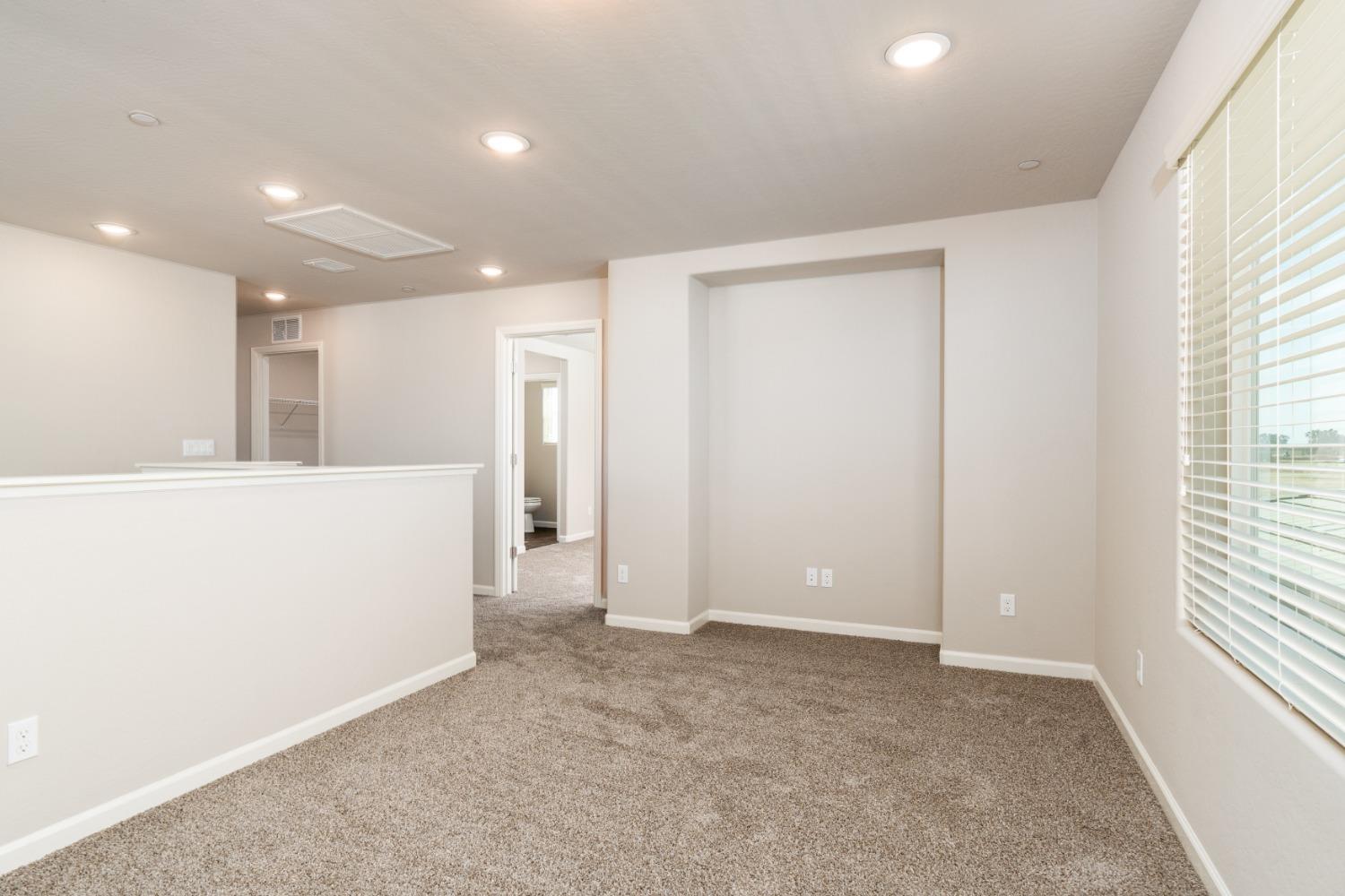 783 Traverse Drive Madera, CA 93636 - Photo 22 of 30 a view of an empty room with a window