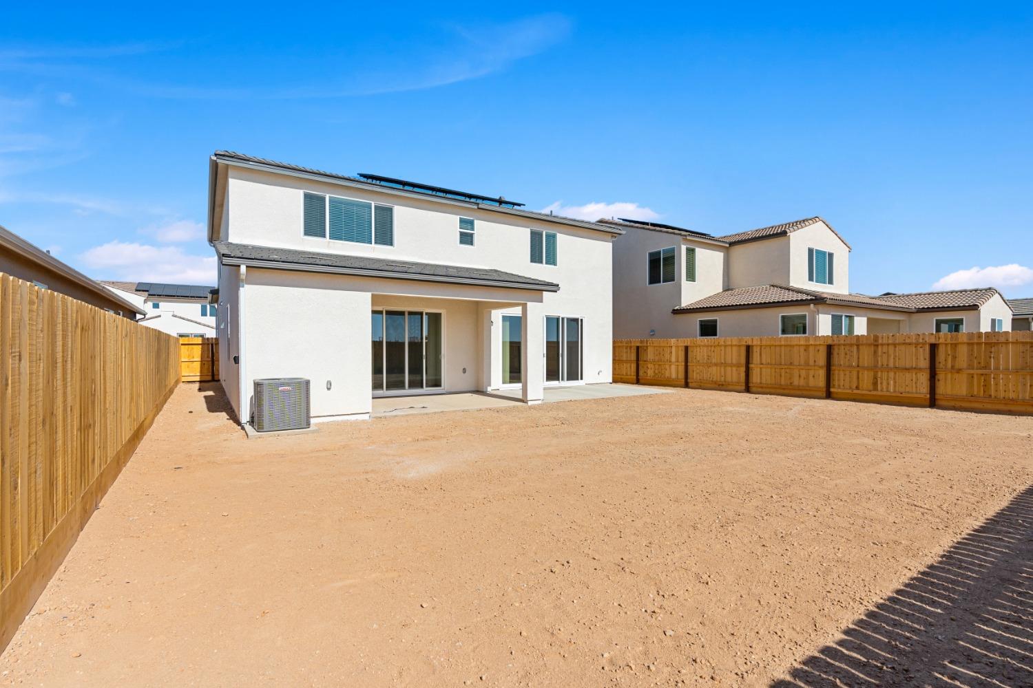 783 Traverse Drive Madera, CA 93636 - Photo 30 of 30 a front view of a house with a yard