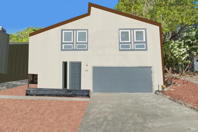 a front view of house with yard