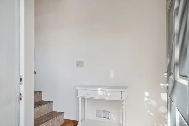 a view of a hallway with entryway