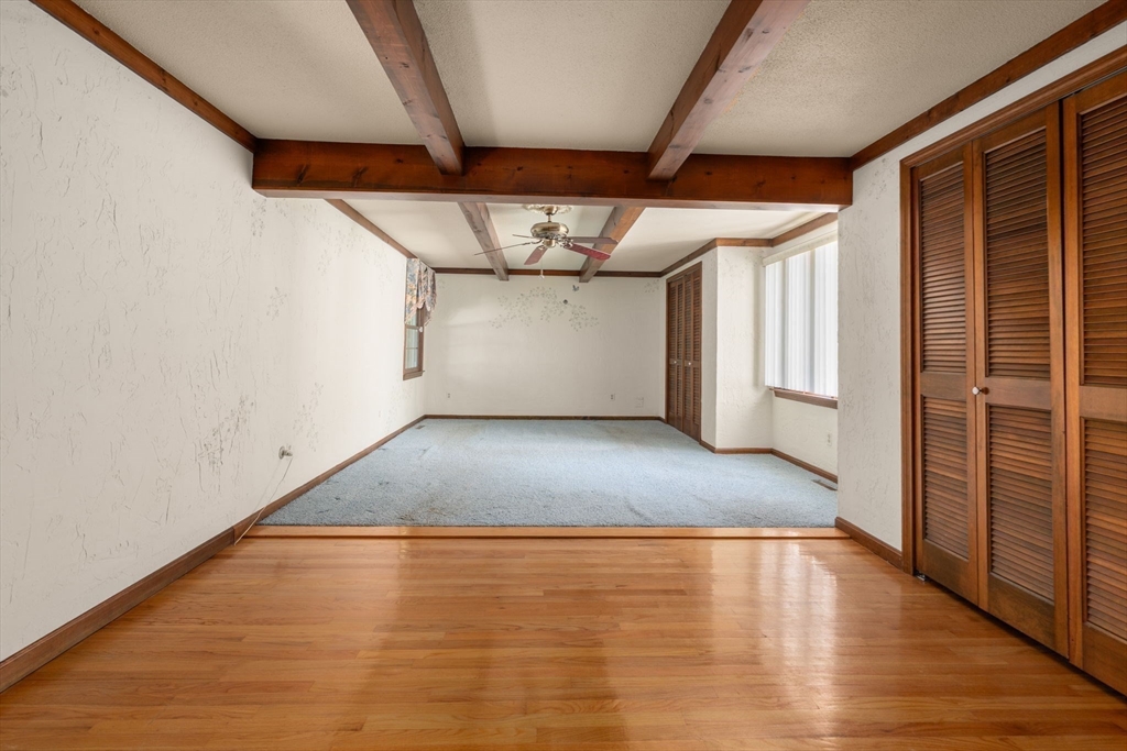 2035 Parker Street Springfield, MA 01128 - Photo 21 of 42 a view of empty room with wooden floor