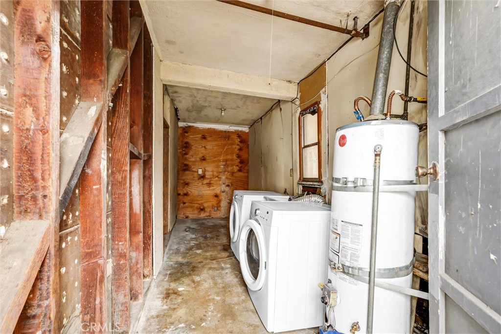 2112 South Burnside Avenue Los Angeles, CA 90016 - Photo 14 of 26 a utility room with dryer and washer