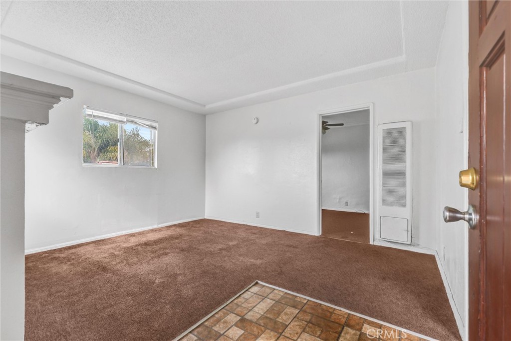 2112 South Burnside Avenue Los Angeles, CA 90016 - Photo 15 of 26 a view of empty room with windows