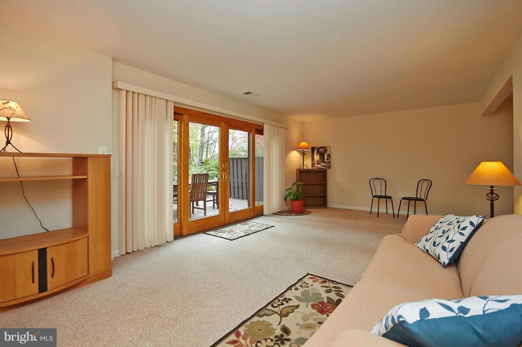 11008 Saffold Way Reston, VA 20190 - Photo 7 of 24 a living room with furniture and a window