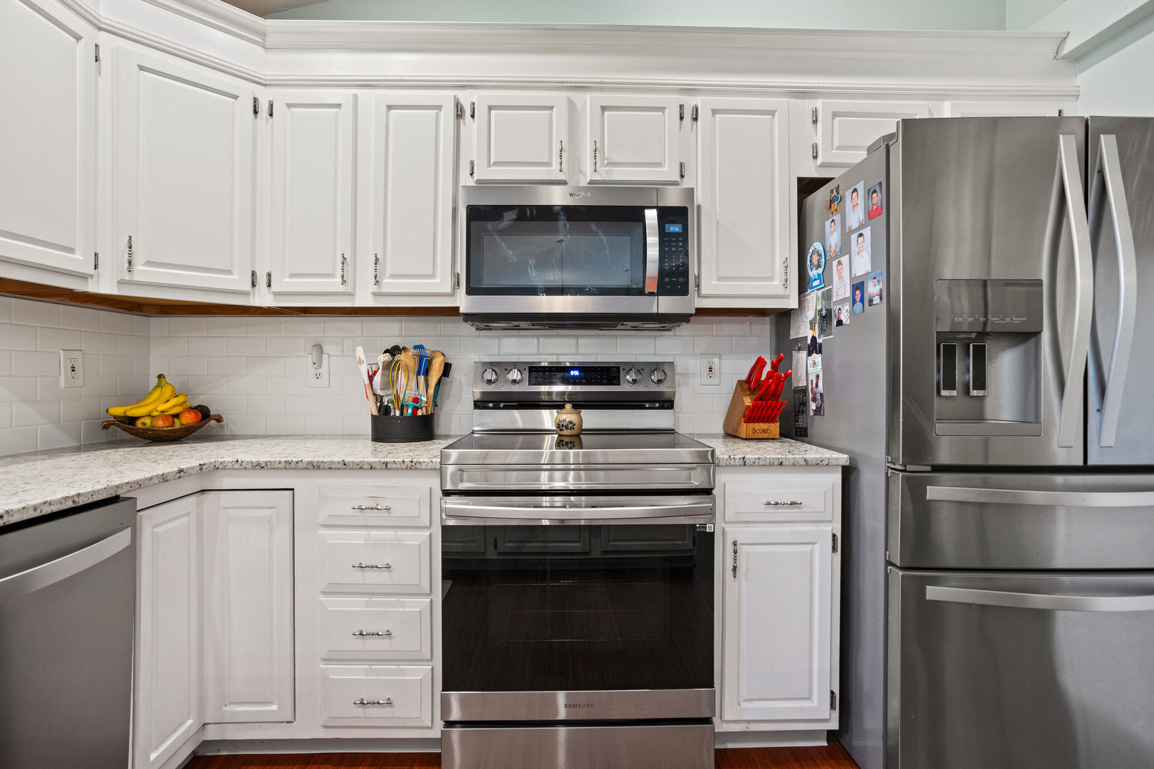 1 Morfey Court Monticello, IL 61856 - Photo 13 of 61 a kitchen with stainless steel appliances white cabinets and a stove top oven