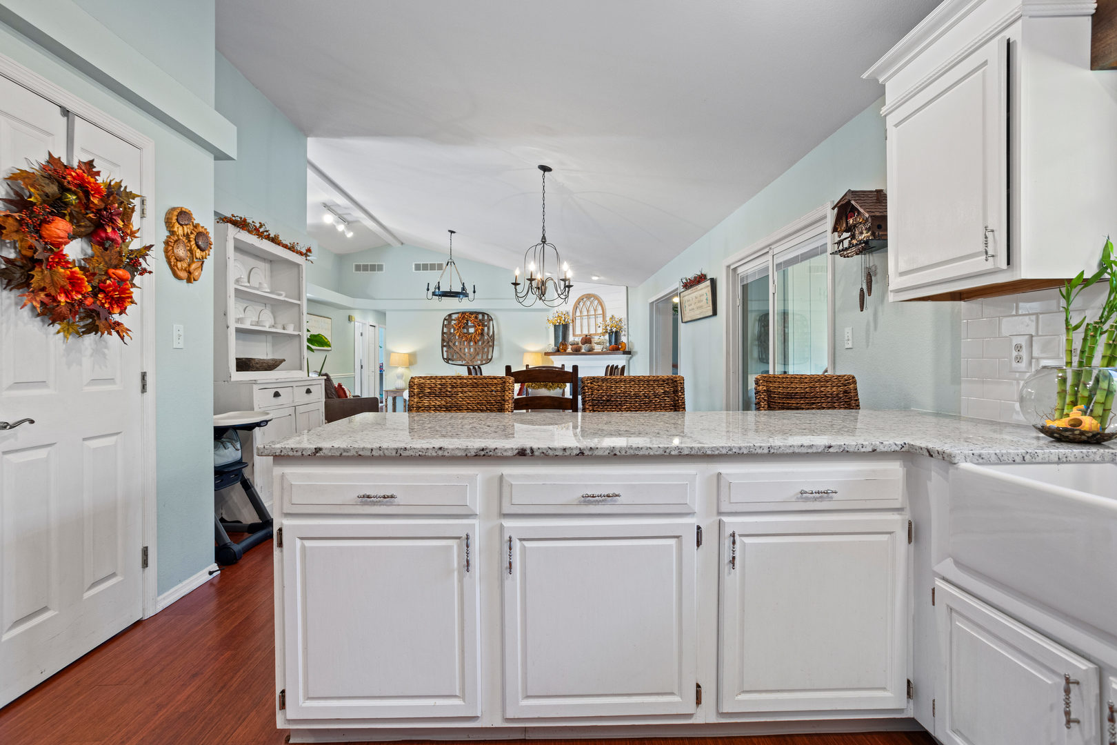 1 Morfey Court Monticello, IL 61856 - Photo 14 of 61 a kitchen with white cabinets and chandelier