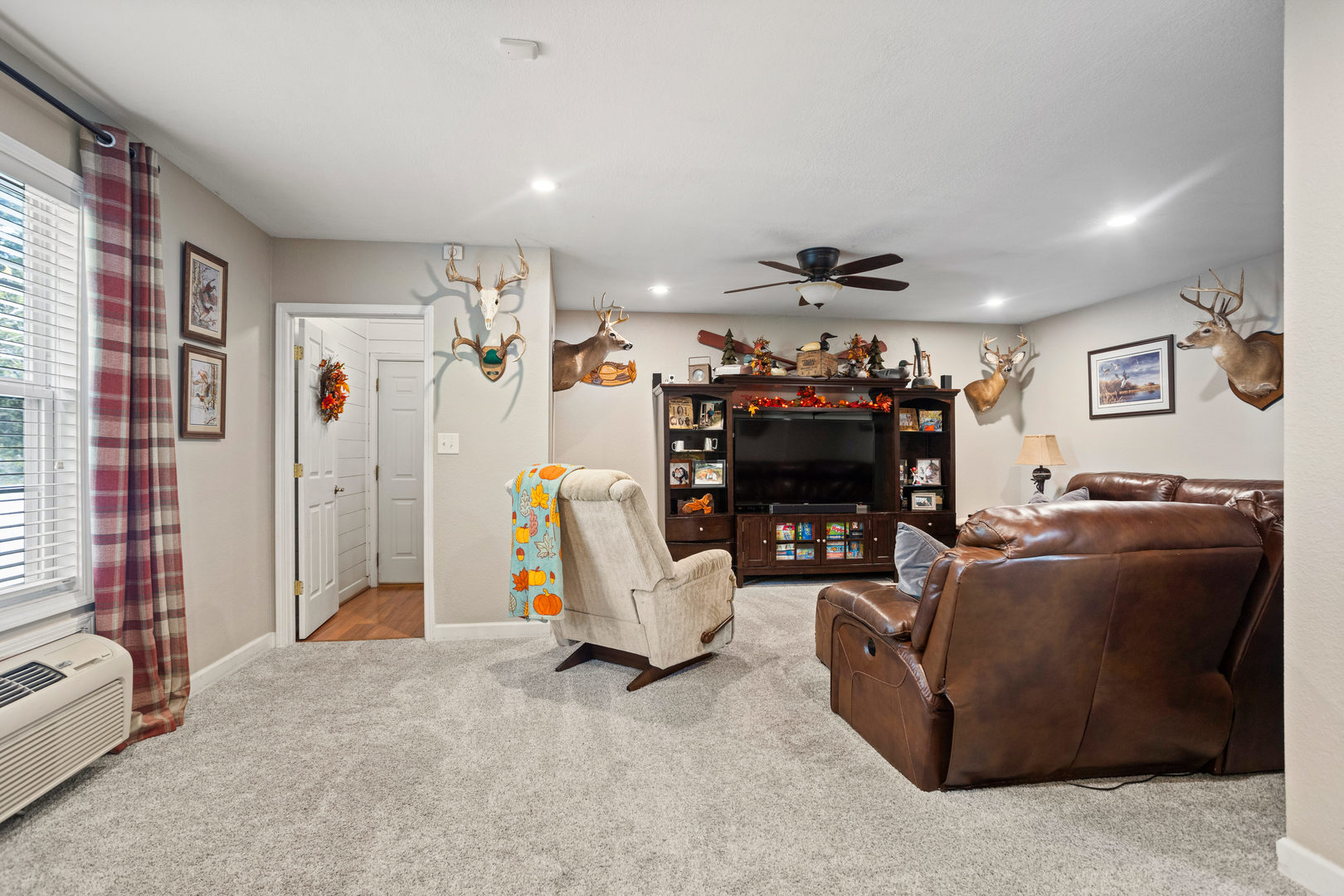 1 Morfey Court Monticello, IL 61856 - Photo 17 of 61 a living room with furniture and a flat screen tv