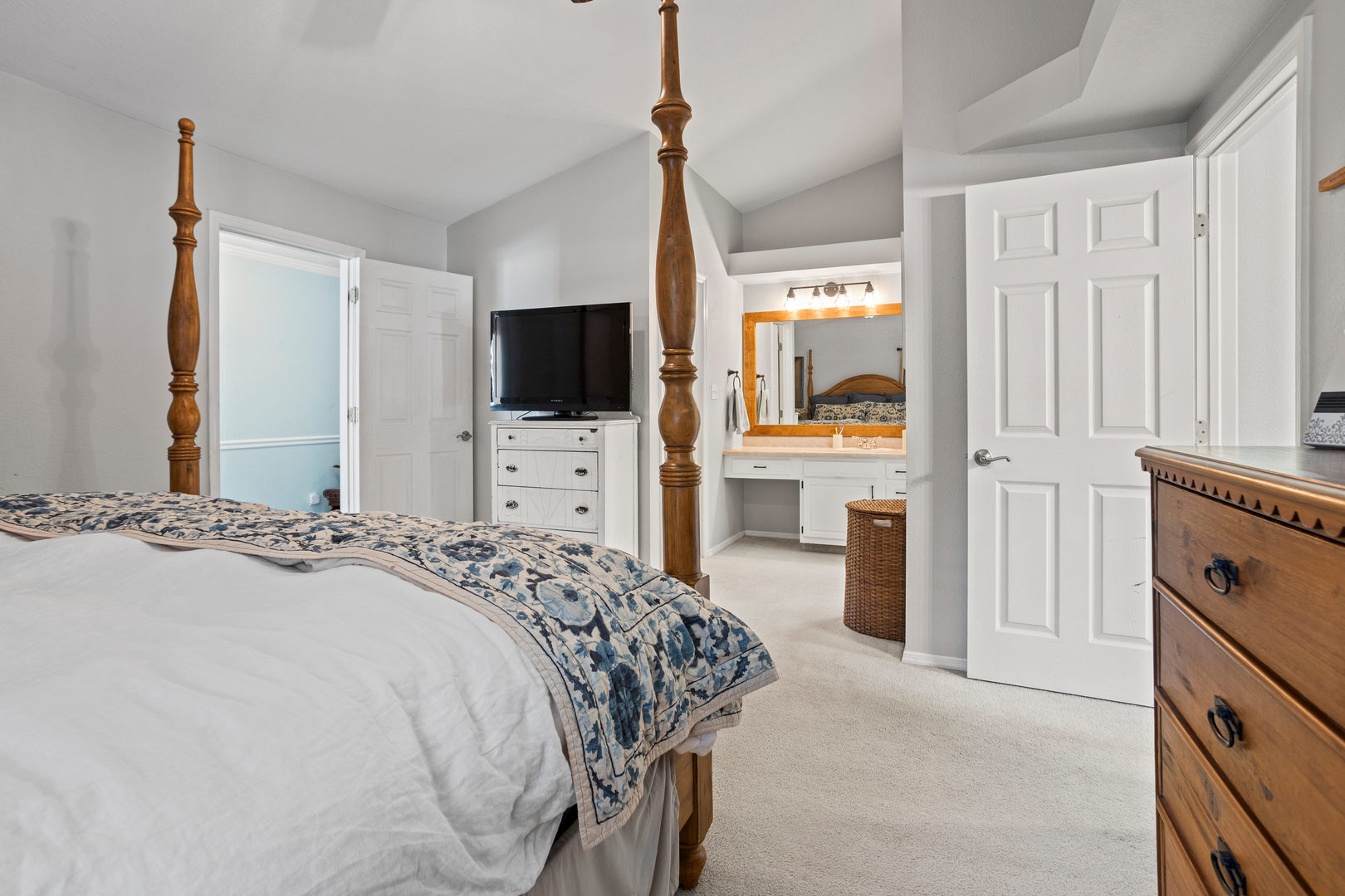1 Morfey Court Monticello, IL 61856 - Photo 27 of 61 a bedroom with a bed and a flat tv screen on dresser