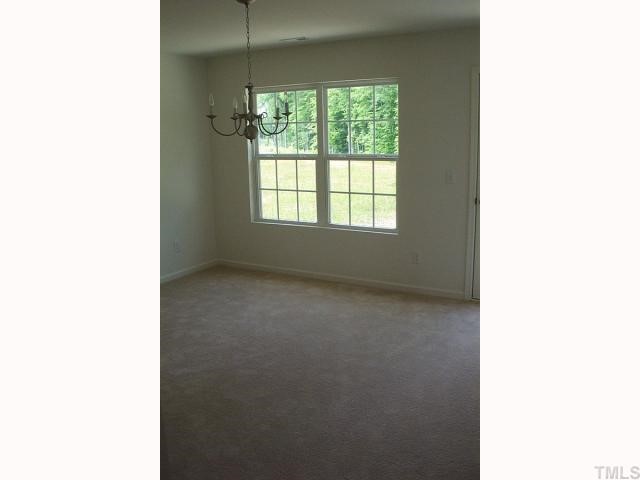 2711 Brownlow Court Raleigh, NC 27610 - Photo 11 of 11 a view of a room that has a window in it