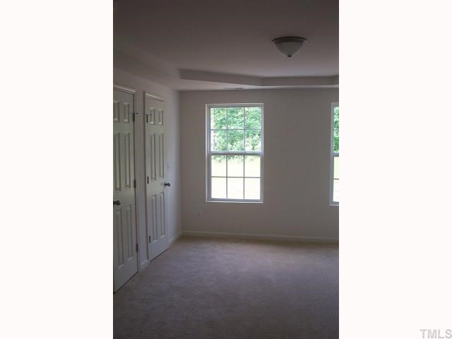 2711 Brownlow Court Raleigh, NC 27610 - Photo 7 of 11 a view of a room that has a window in it