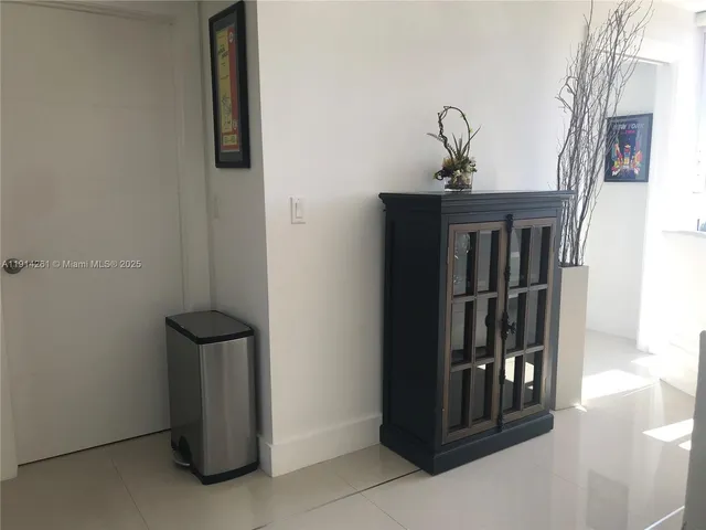 a living room with a couch and a flat screen tv