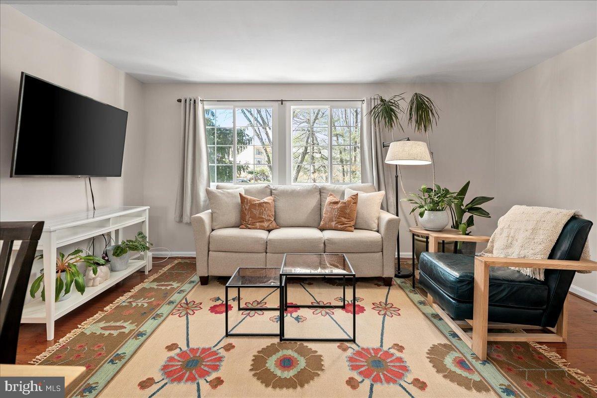 1642 Harvest Green Court Reston, VA 20194 - Photo 17 of 46 a living room with furniture and a flat screen tv