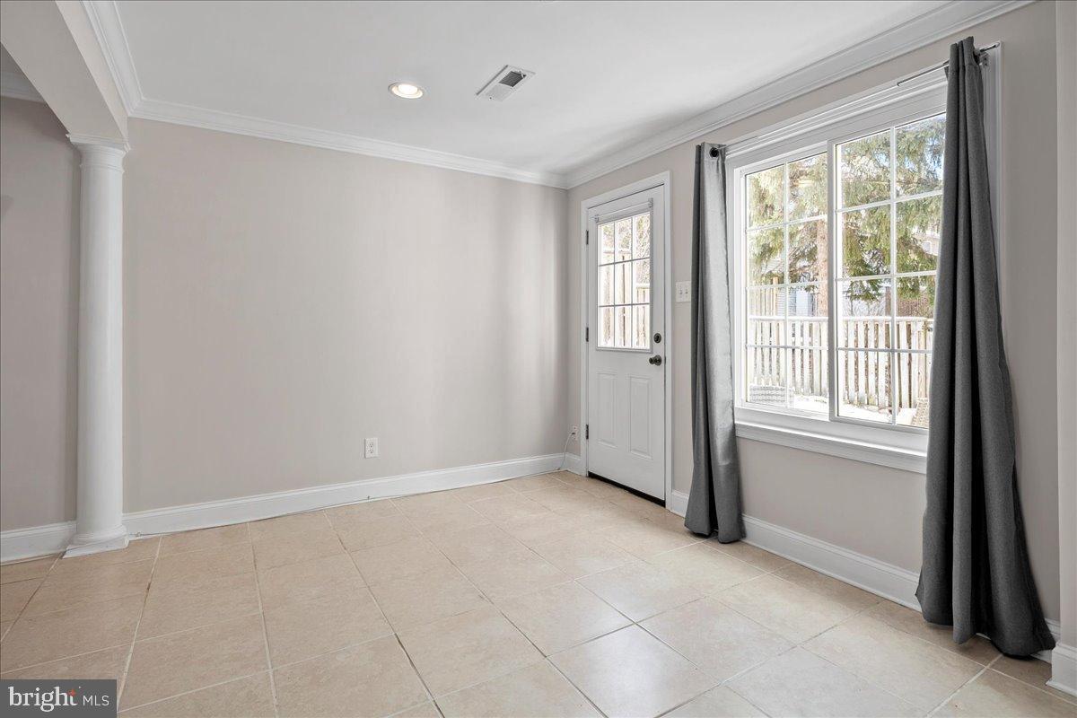 1642 Harvest Green Court Reston, VA 20194 - Photo 37 of 46 a view of an empty room with a window