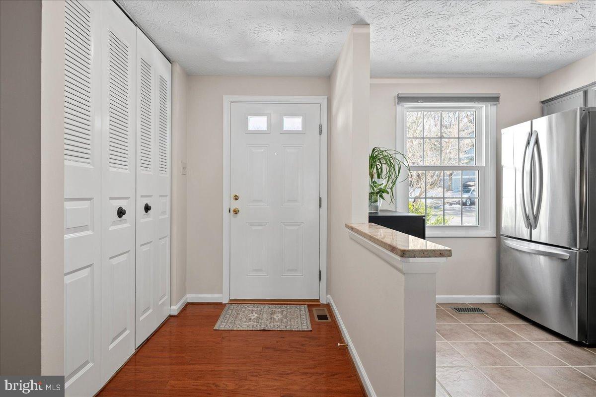 1642 Harvest Green Court Reston, VA 20194 - Photo 6 of 46 a room with a washer and dryer