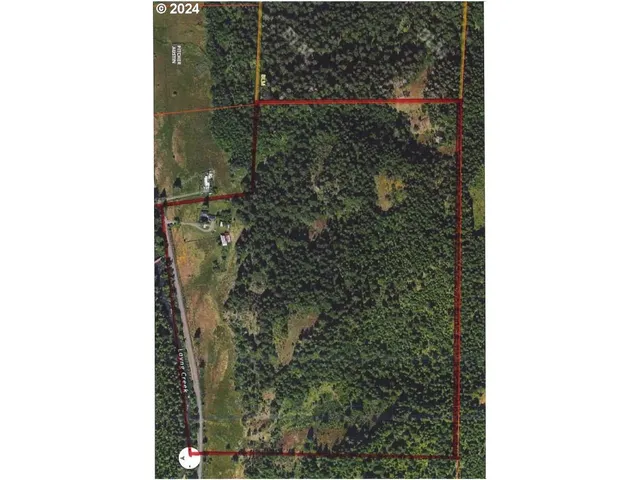 a picture of a bathroom with a shower curtain