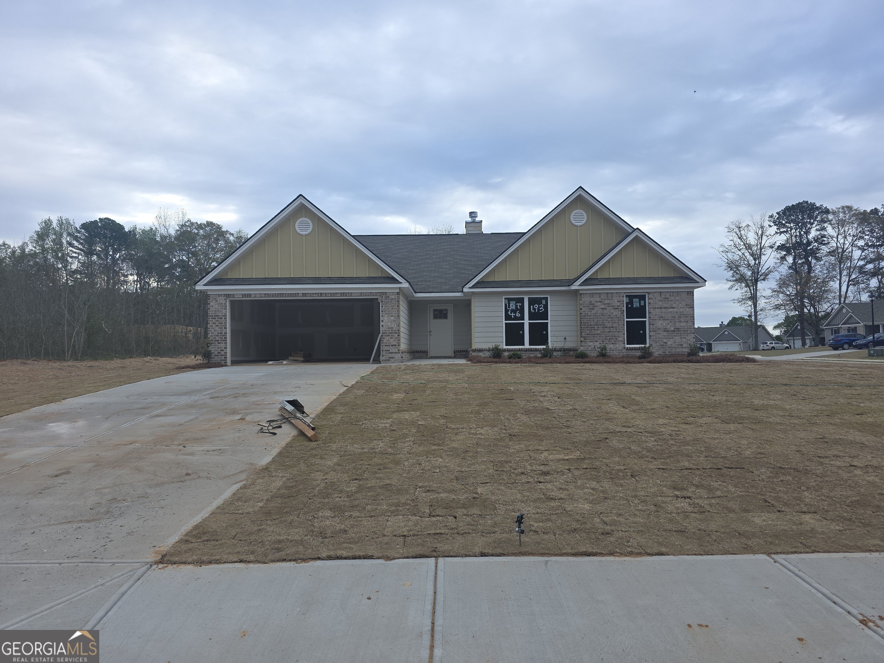 193 Windrow Trail, Unit 46 Statham, GA 30666 - Photo 2 of 5 front view of house with a yard
