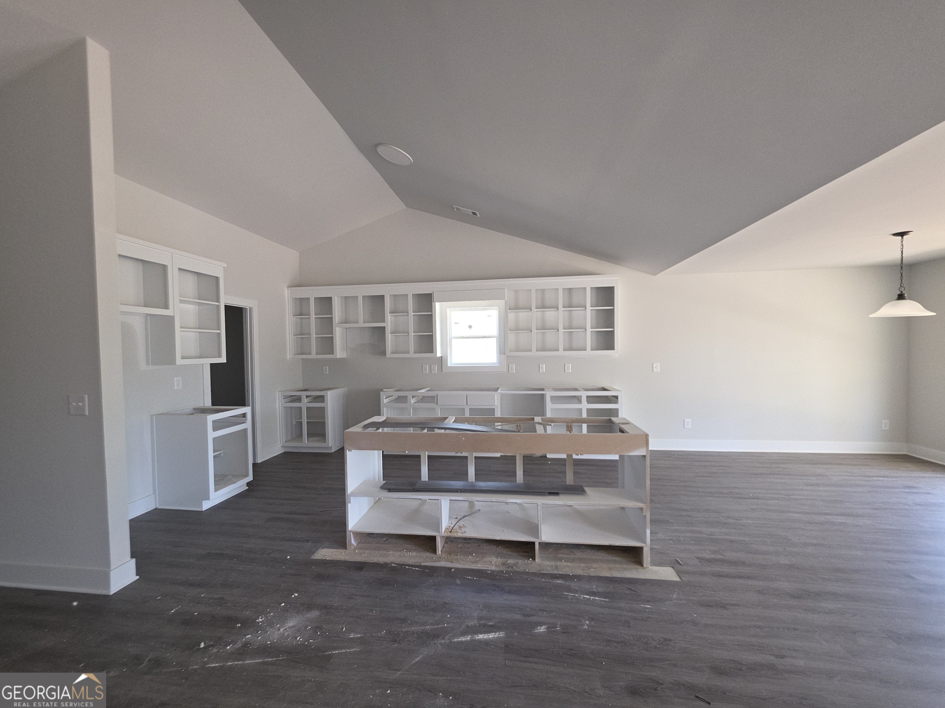 193 Windrow Trail, Unit 46 Statham, GA 30666 - Photo 5 of 5 a living room with furniture a large window and wooden floor