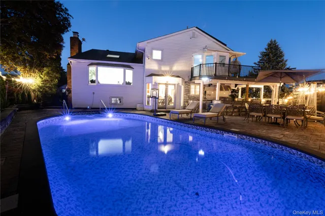 a front view of a house with swimming pool