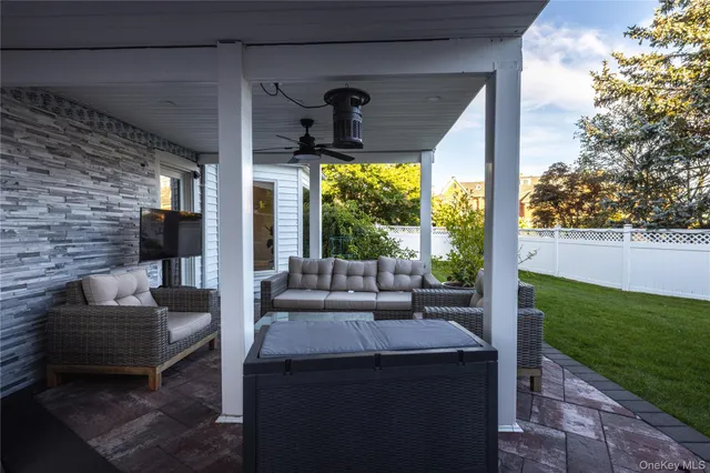 a outdoor living space with furniture and garden view