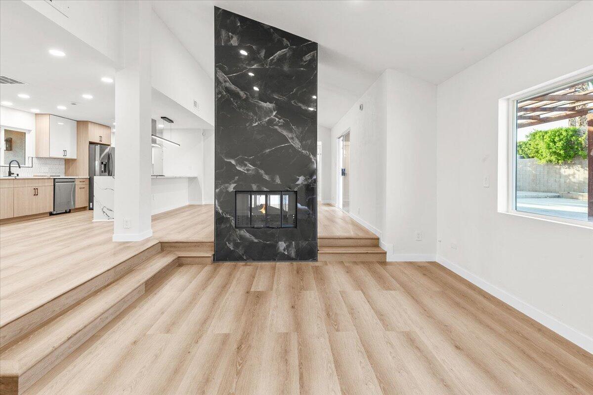 3190 East Vincentia Road Palm Springs, CA 92262 - Photo 8 of 30 a view of empty room with wooden floor and fan