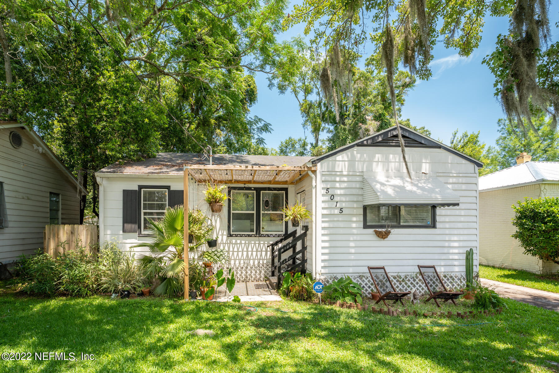 5015 Birkenhead Road Jacksonville, FL 32210 - Photo 1 of 17 a view of a house with a yard