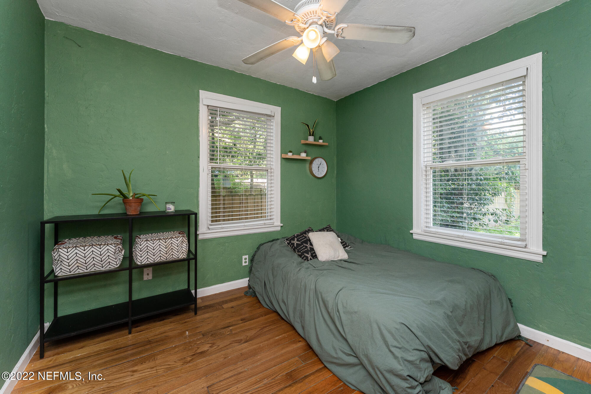 5015 Birkenhead Road Jacksonville, FL 32210 - Photo 12 of 17 a bedroom with a bed window and a window