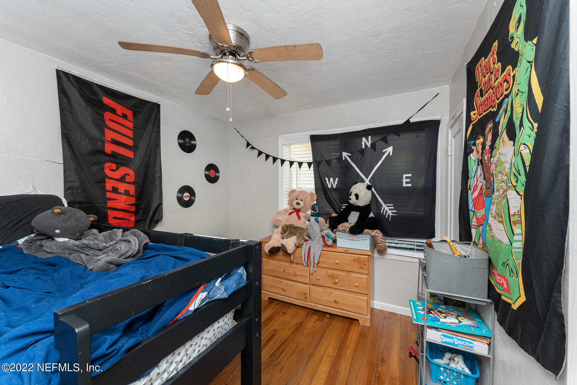 5015 Birkenhead Road Jacksonville, FL 32210 - Photo 14 of 17 a living room with furniture and wooden floor