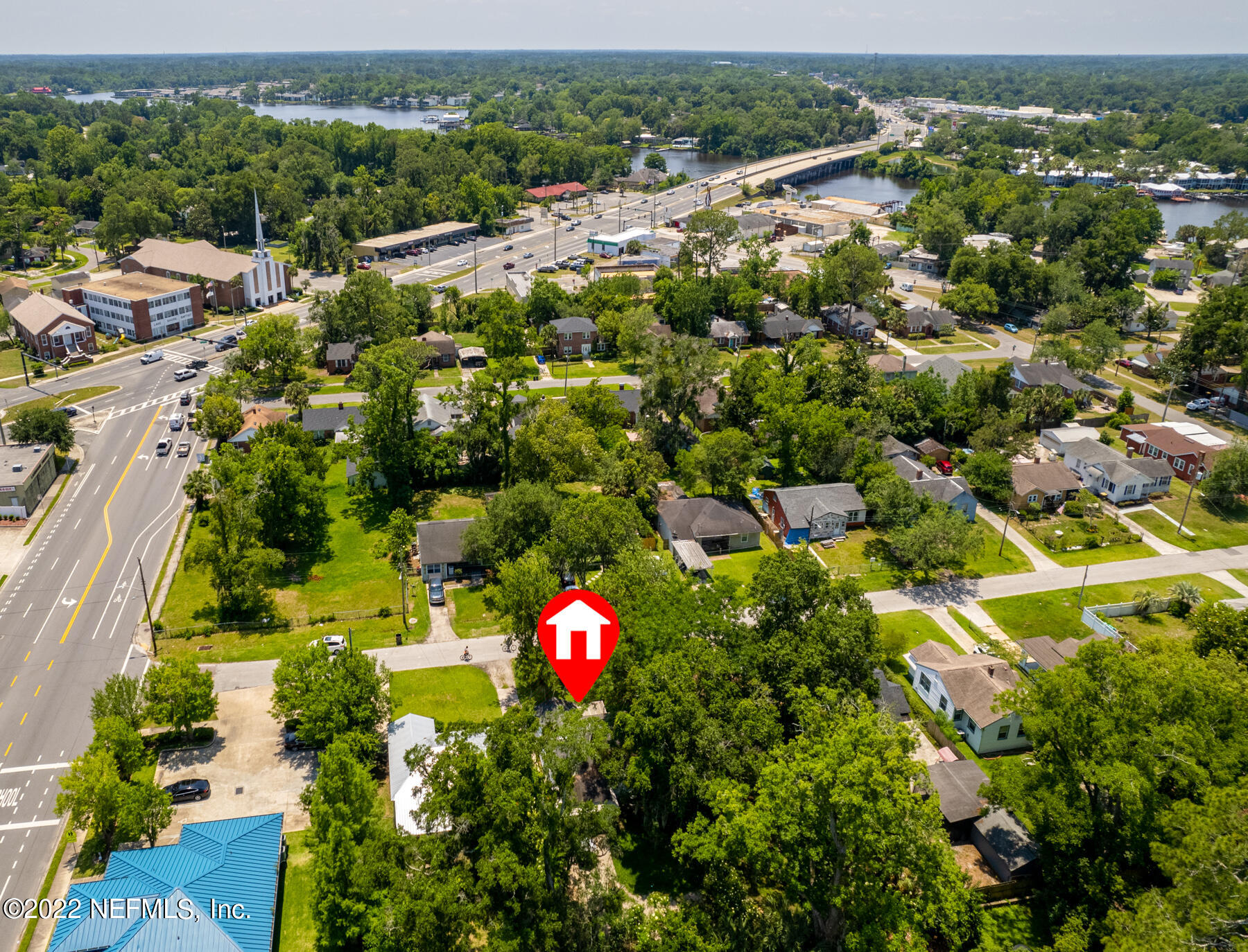 5015 Birkenhead Road Jacksonville, FL 32210 - Photo 16 of 17 an aerial view of residential houses with outdoor space and street view