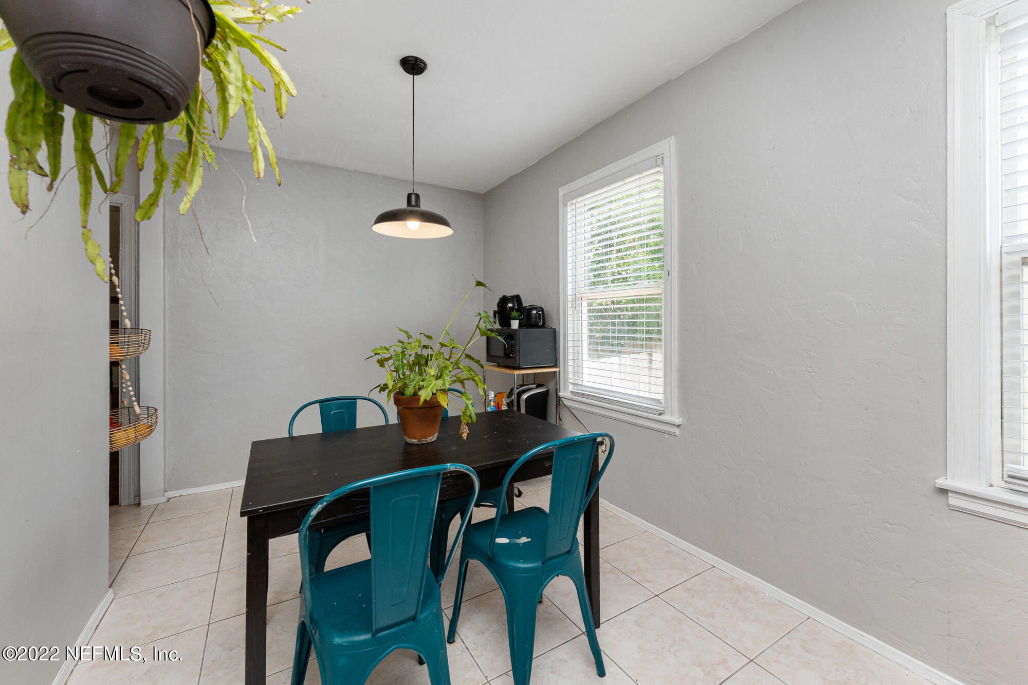 5015 Birkenhead Road Jacksonville, FL 32210 - Photo 6 of 17 a dining room with furniture and window