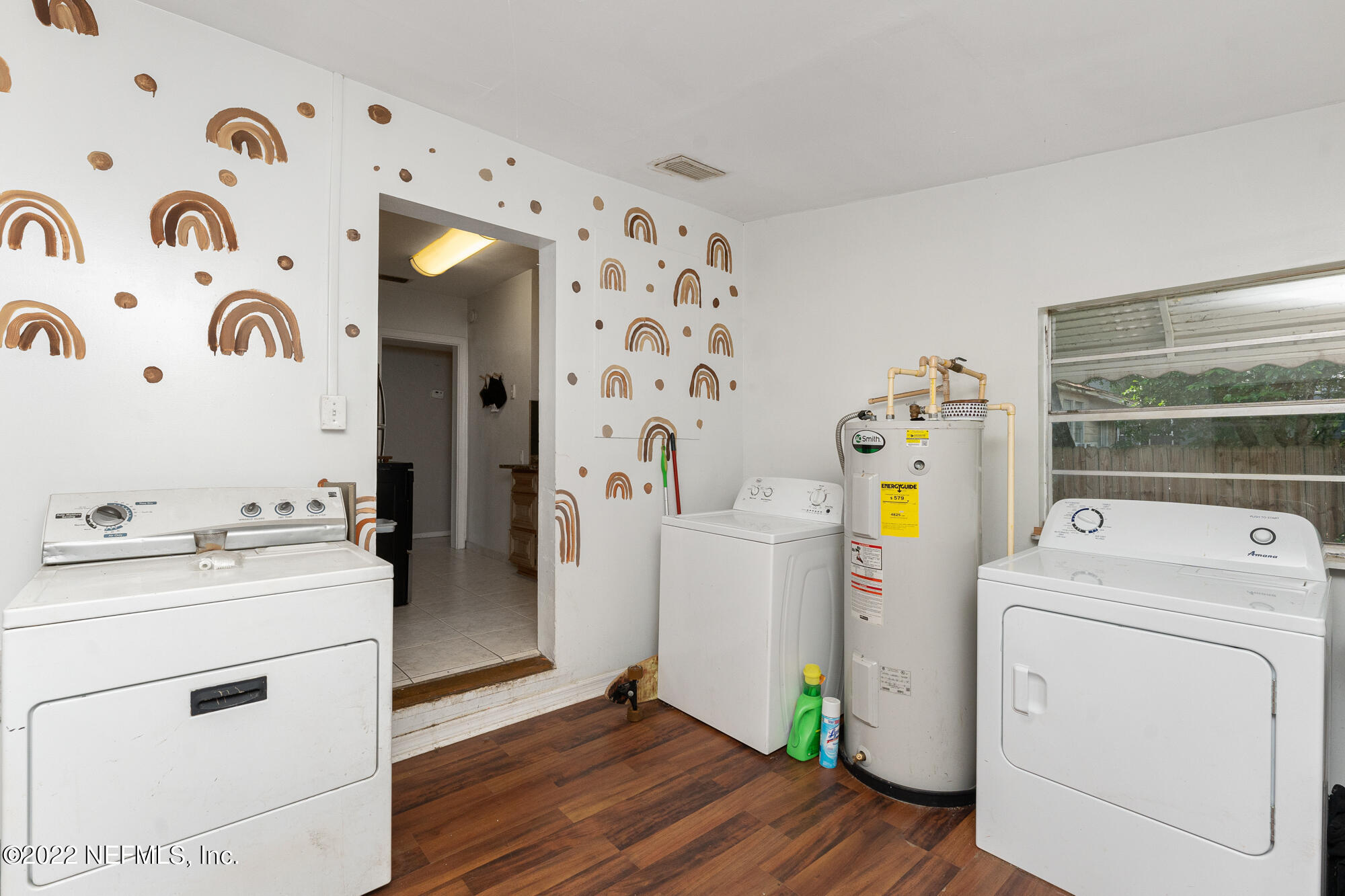 5015 Birkenhead Road Jacksonville, FL 32210 - Photo 10 of 17 a utility room with dryer and washer