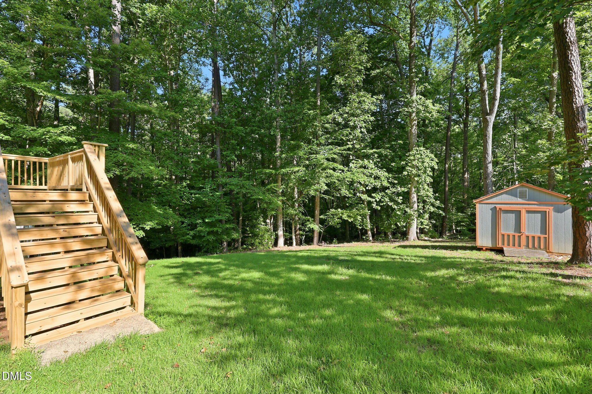11129 Lakeshore Drive Raleigh, NC 27613 - Photo 29 of 32 Backyard 1