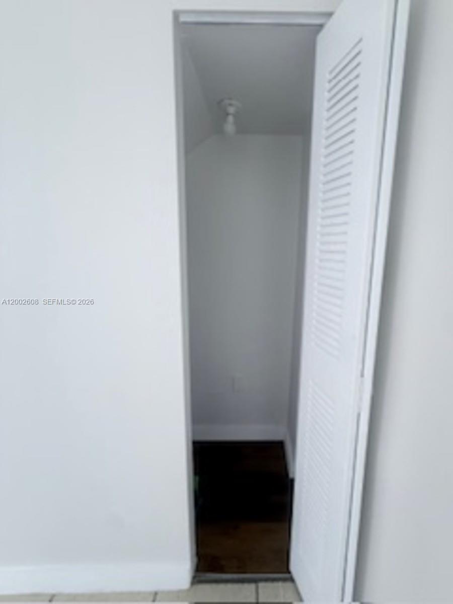 5966 Southwest 68th Street, Unit 109 Miami, FL 33143 - Photo 11 of 12 a view of walk in closet
