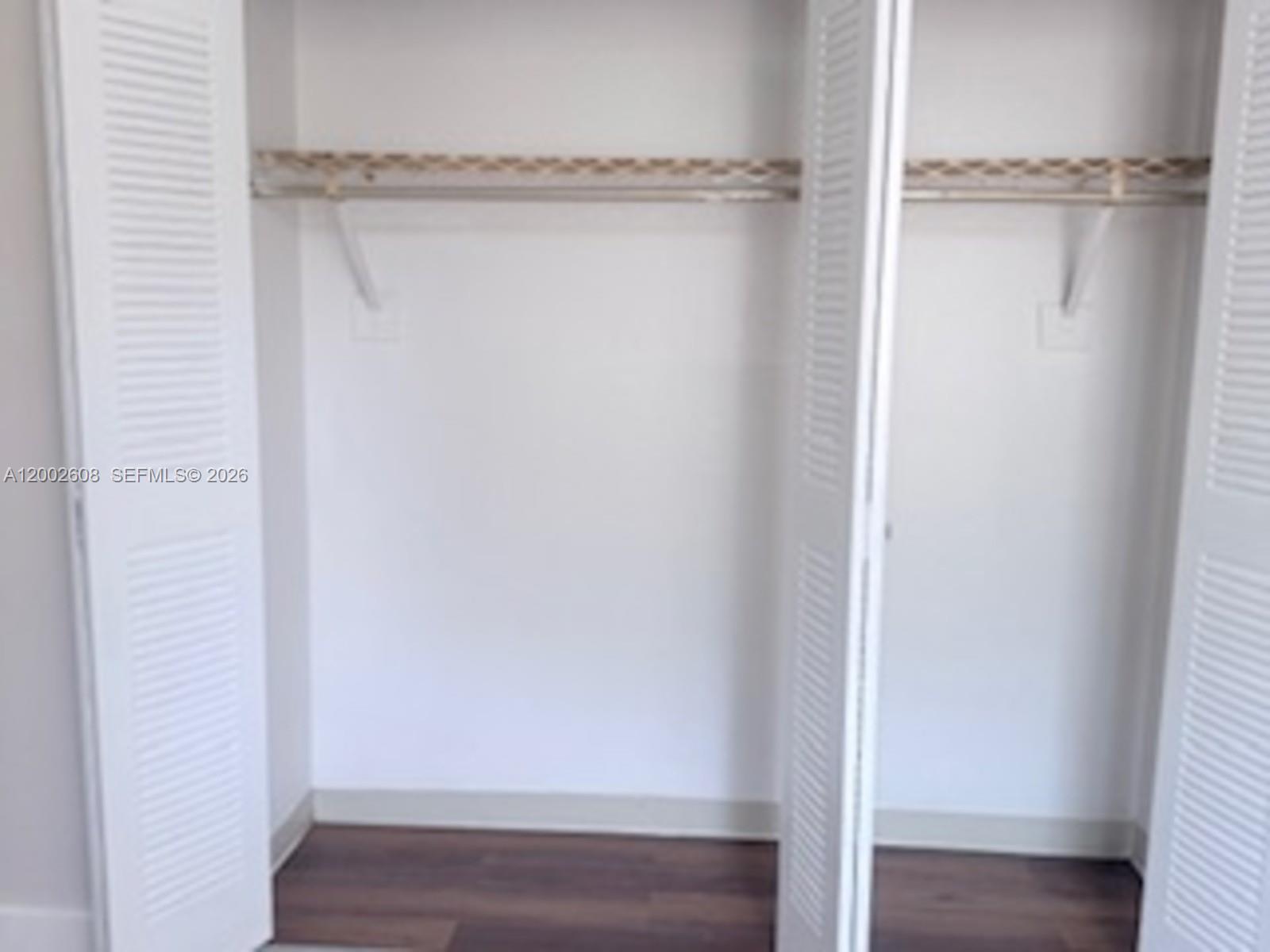 5966 Southwest 68th Street, Unit 109 Miami, FL 33143 - Photo 4 of 12 a view of closet