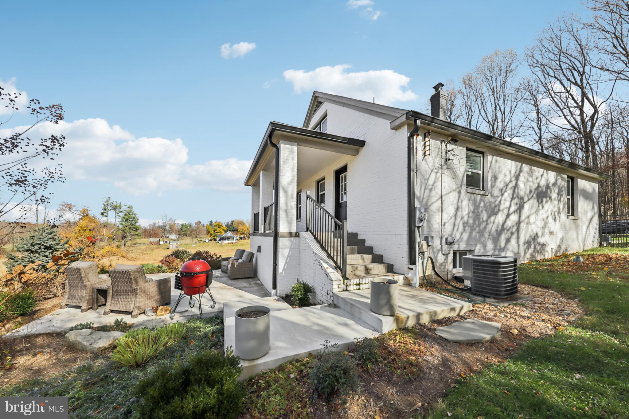 5676 O'Bannon Road The Plains, VA 20198 - Photo 33 of 36 Rear Covered Porch and Lower Patio