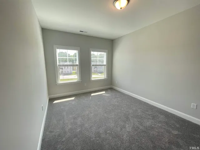 an empty room with an entryway