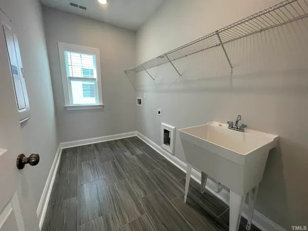 a view of a house with a street