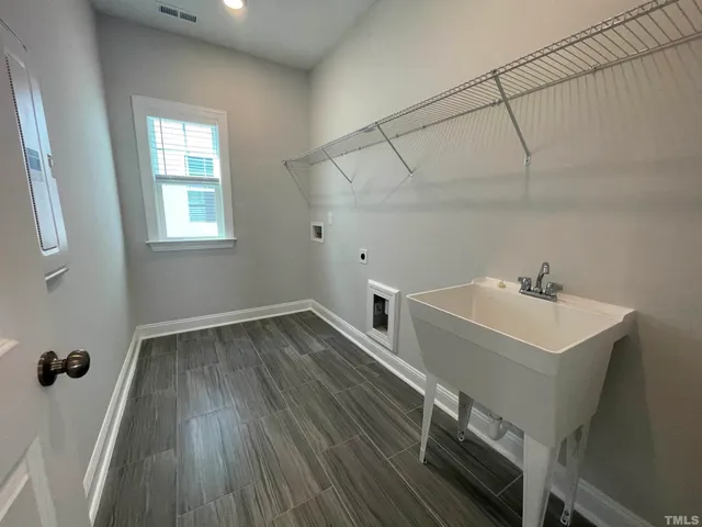 a view of a house with a street