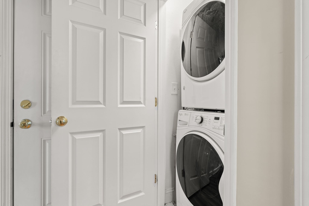 10 Malta Street, Unit 1 Hull, MA 02045 - Photo 14 of 17 a close view of a utility room with dryer and washer