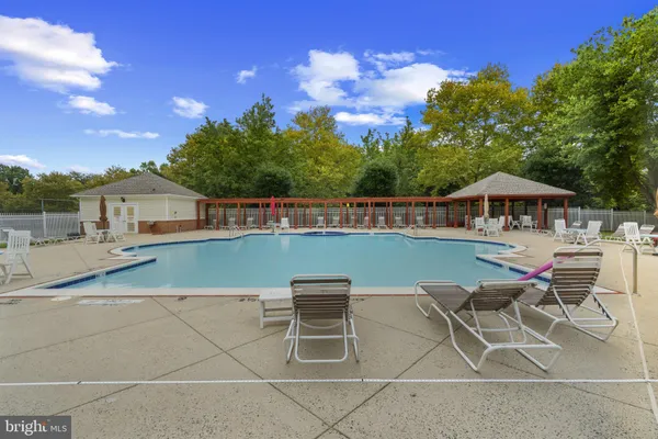 a view of house with outdoor seating space