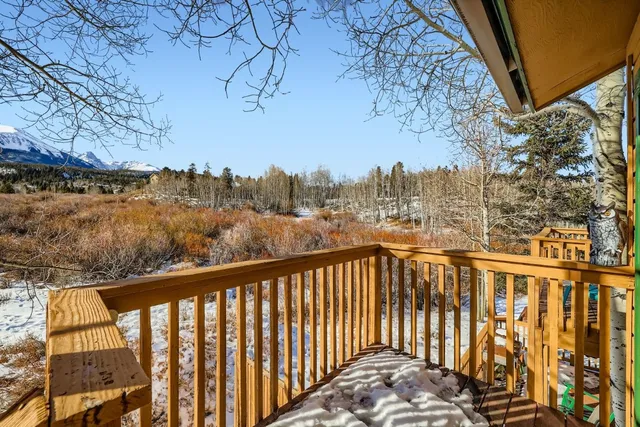 a view of a balcony with lake view and a ocean view