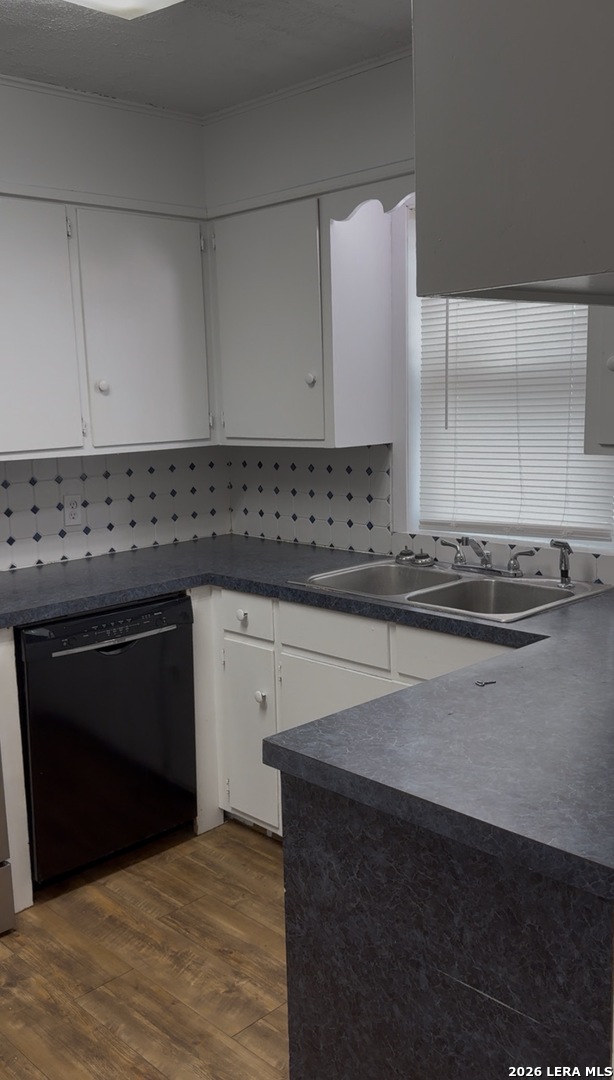 106 Adkins Road Refugio, TX 78377 - Photo 9 of 11 a kitchen with a sink and cabinets